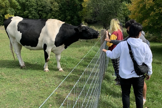 Students with Cow