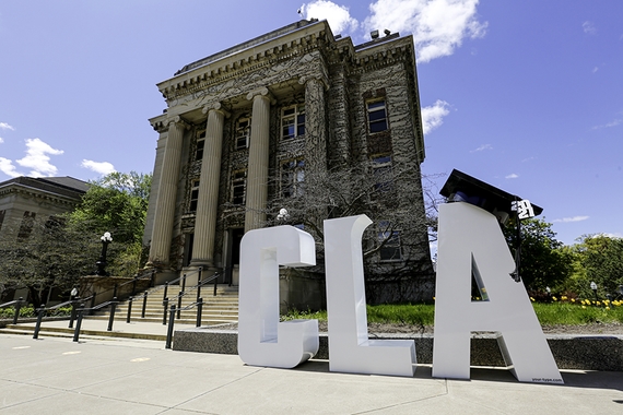 Image of giant CLA letters in front of Johnston Hall