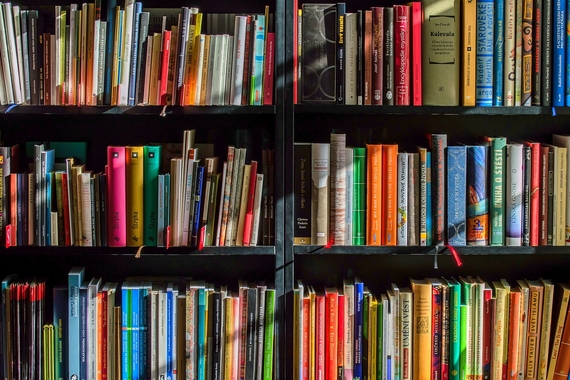 a book shelf with many books