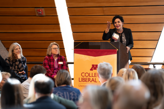 Fahima Aziz accepting her award for excellence in undergraduate teaching in 2024