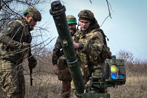 Ukrainian soldiers install an anti-tank missile systems ‘Stugna’ near Bakhmut, Donetsk region, Ukraine, Friday, March 17, 2023.
