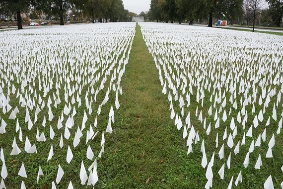 White lawn flags on grass