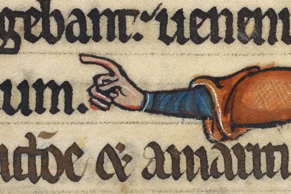 Manicule in a manuscript with the hand pointing to the left.