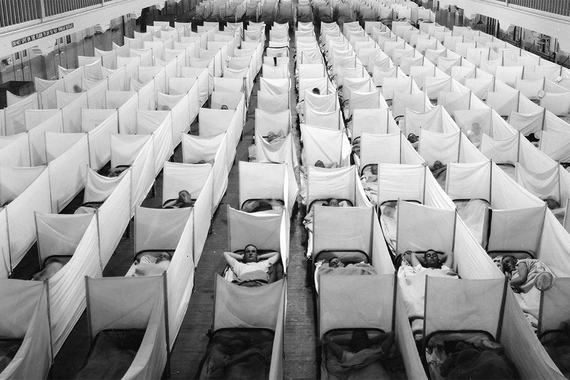 Soldiers barracks separated by sheets during 1918 Influenza