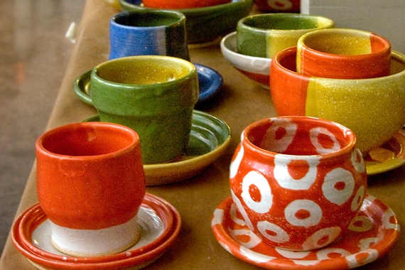Photo of colorful ceramic pots, cups, and plates