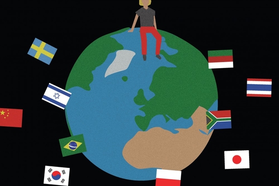 an illustration of a person sitting on top of the earth, surrounded by flags from around the world