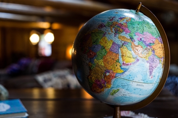 Photo of a World Globe on a Desk