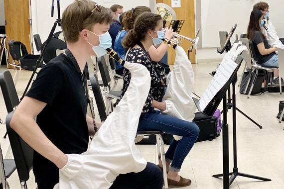 Music students in rehearsal, woodwind instruments using Torpedo bag coverings