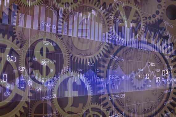 Abstract financial imagery with symbols of different currencies overlaid with bar charts