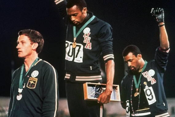 The gesture by the athletes Tommie Smith, center, and John Carlos at the 1968 Olympics was ultimately widely seen as a landmark in the civil rights movement.