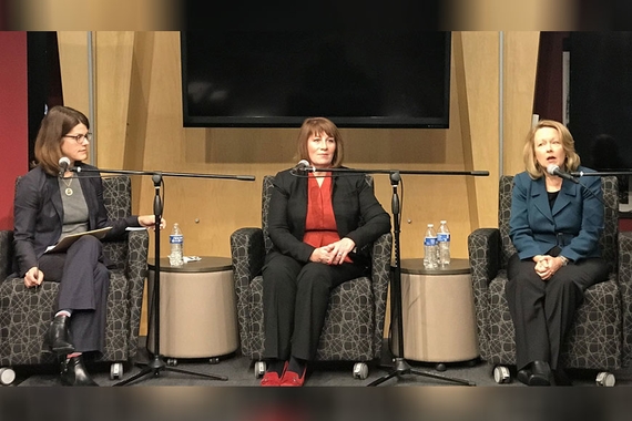 U of M professor Kathryn Pearson seated on a stage with former state Rep. Jenifer Loon and former state Rep. Erin Murphy. 