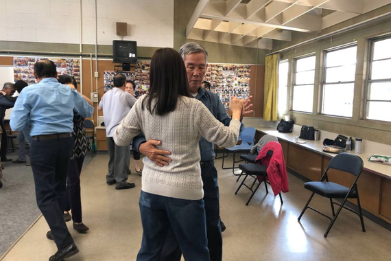 Tam Tran, 78, says tai chi and ballroom dancing classes help him improve his health, and that with music, he feels better as he exercises. Theodora Yu