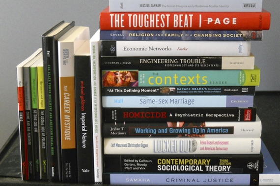 Stack of Sociology faculty publications (book spines)