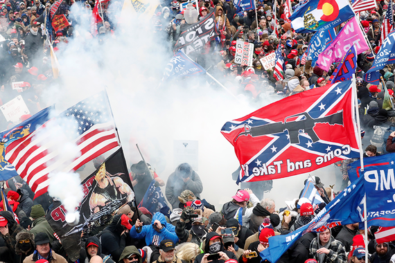 Tear gas is released into the crowd of rioters during clashes with U.S. Capitol police on January 6.