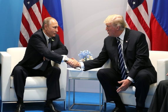 Donald Trump shaking hands with Vladimir Putin