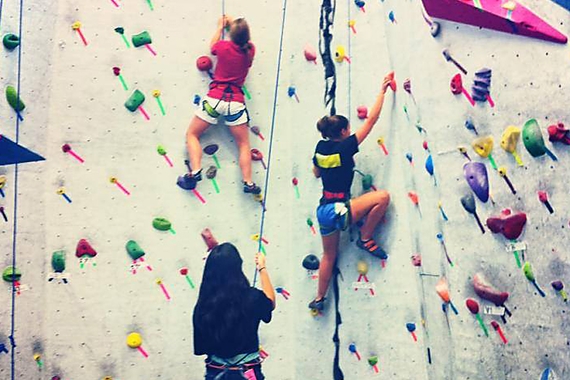Public Health Association students indoor rock climbing