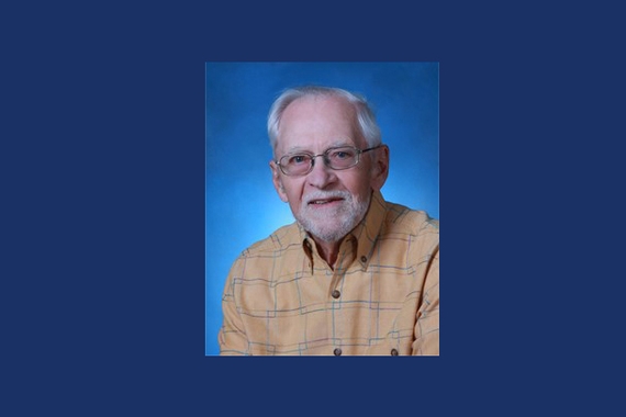 Photo of the late Regents Professor Emeritus George T. Wright on blue background