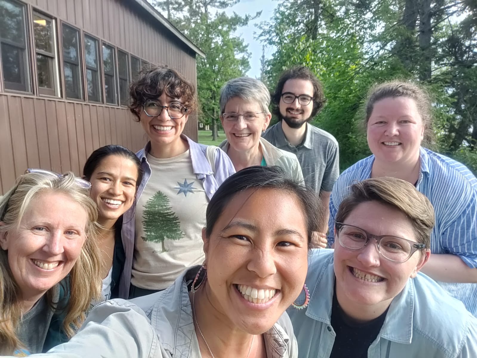 Eight faculty participants pose for a selfie during the RIDGS Faculty Summer Writing Retreat